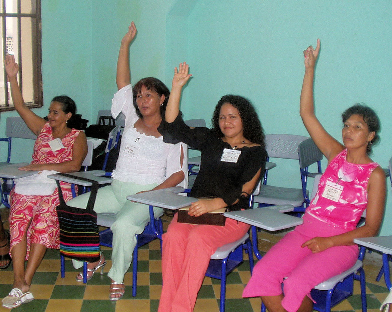 Colombian 4 women-raising-hands